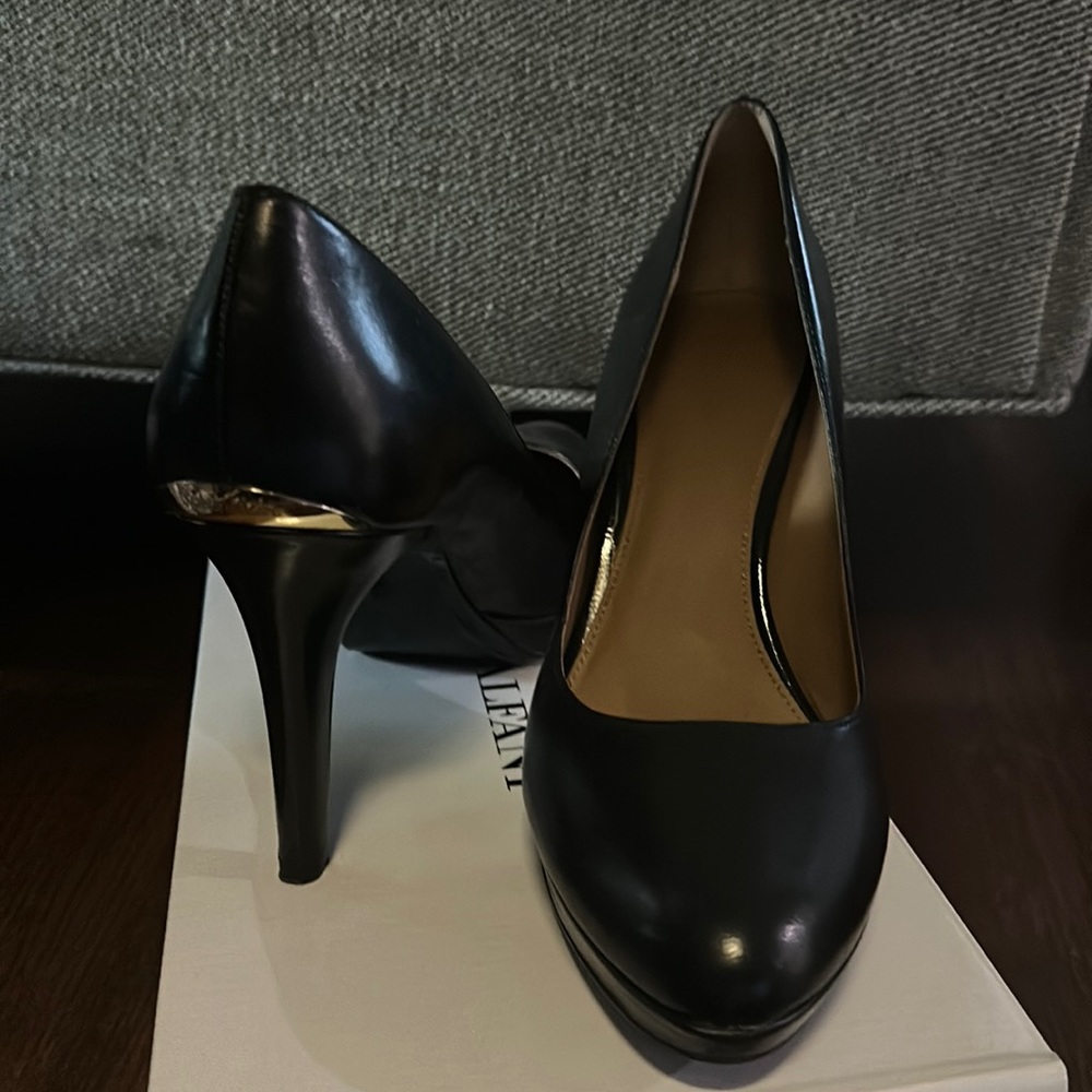 Calvin Klein black patent leather 4” heels with gold accent size 9